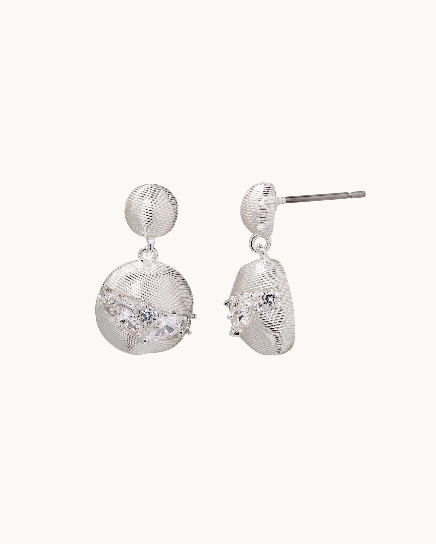 TRUE Solid or Plated Show off your style with these Demi-Fine earrings. Made of 14K plated gold, the design features a Brushed Metal Organic Drop Ear - Silver.
