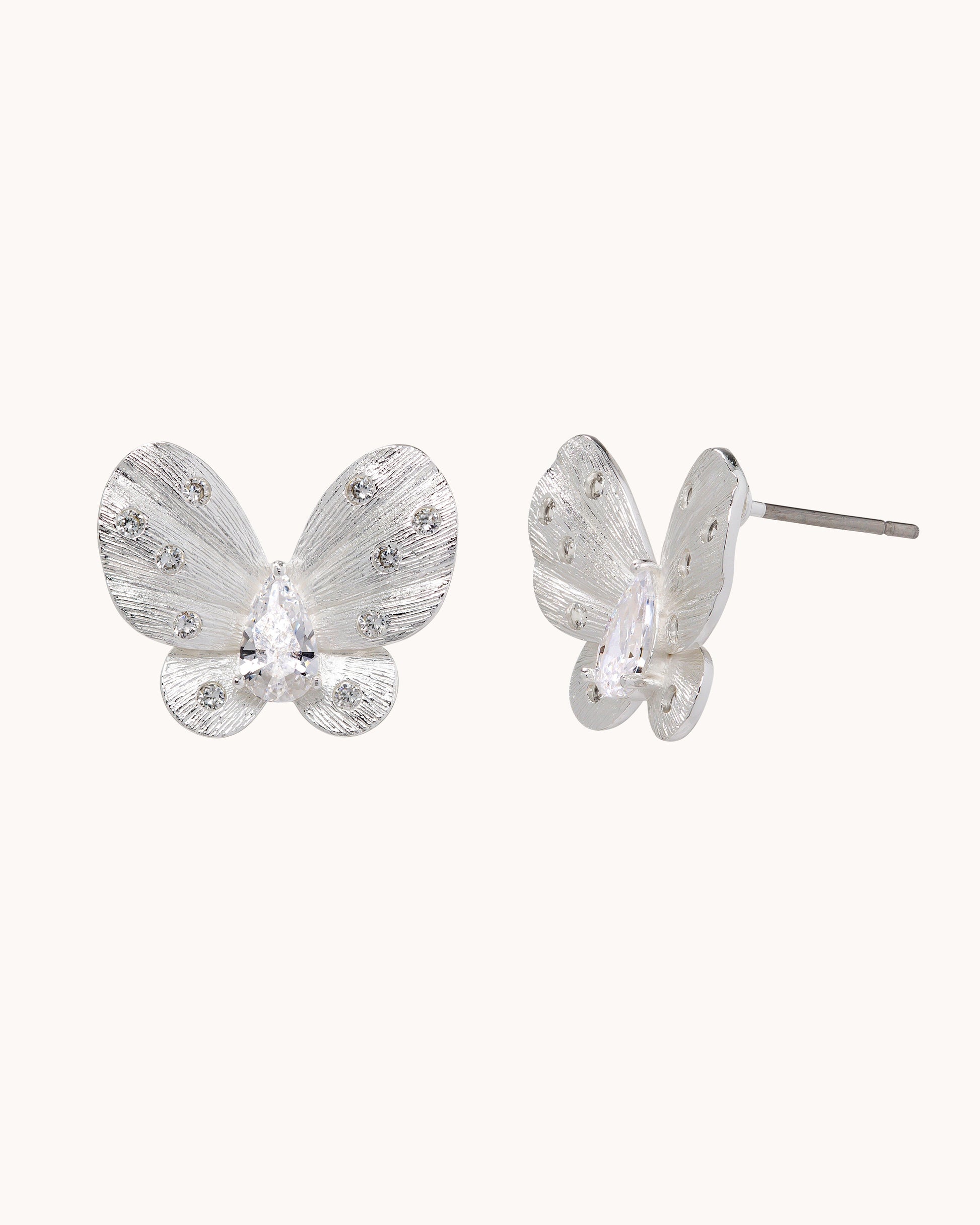 TRUE Solid or Plated Make a fashion statement with these Demi-Fine earrings. Made of 14K plated gold, the design features a Brushed Butterfly Ear - Silver. 