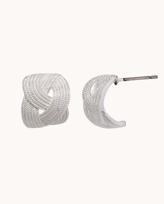 TRUE Solid or Plated Make a fashion statement with these Demi-Fine earrings. Made of 14K plated gold, the design features a Textured Woven Hoop - Silver. 