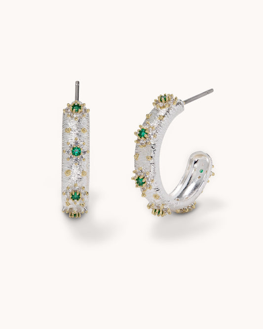 TRUE Solid or Plated Show off your style with these Demi-Fine earrings. Made of 14K plated gold, the design features a Multi Stone Textured Hoop - Emerald/Two Tone Silver. 