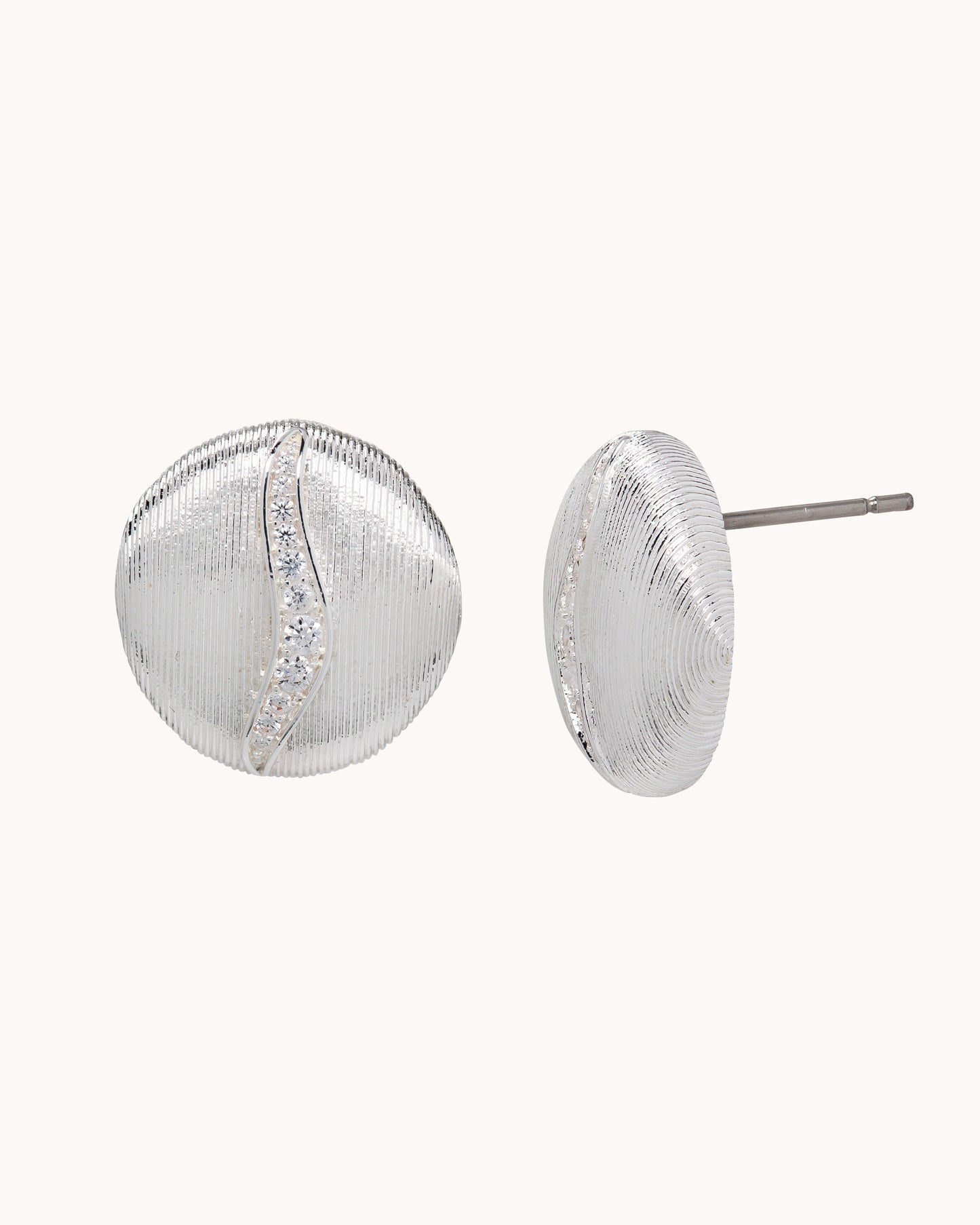 TRUE Solid or Plated Add a unique piece to your wardrobe with these Demi-Fine earrings. Made of 14K plated gold, the design features a Brushed Button Ear - Silver. 
