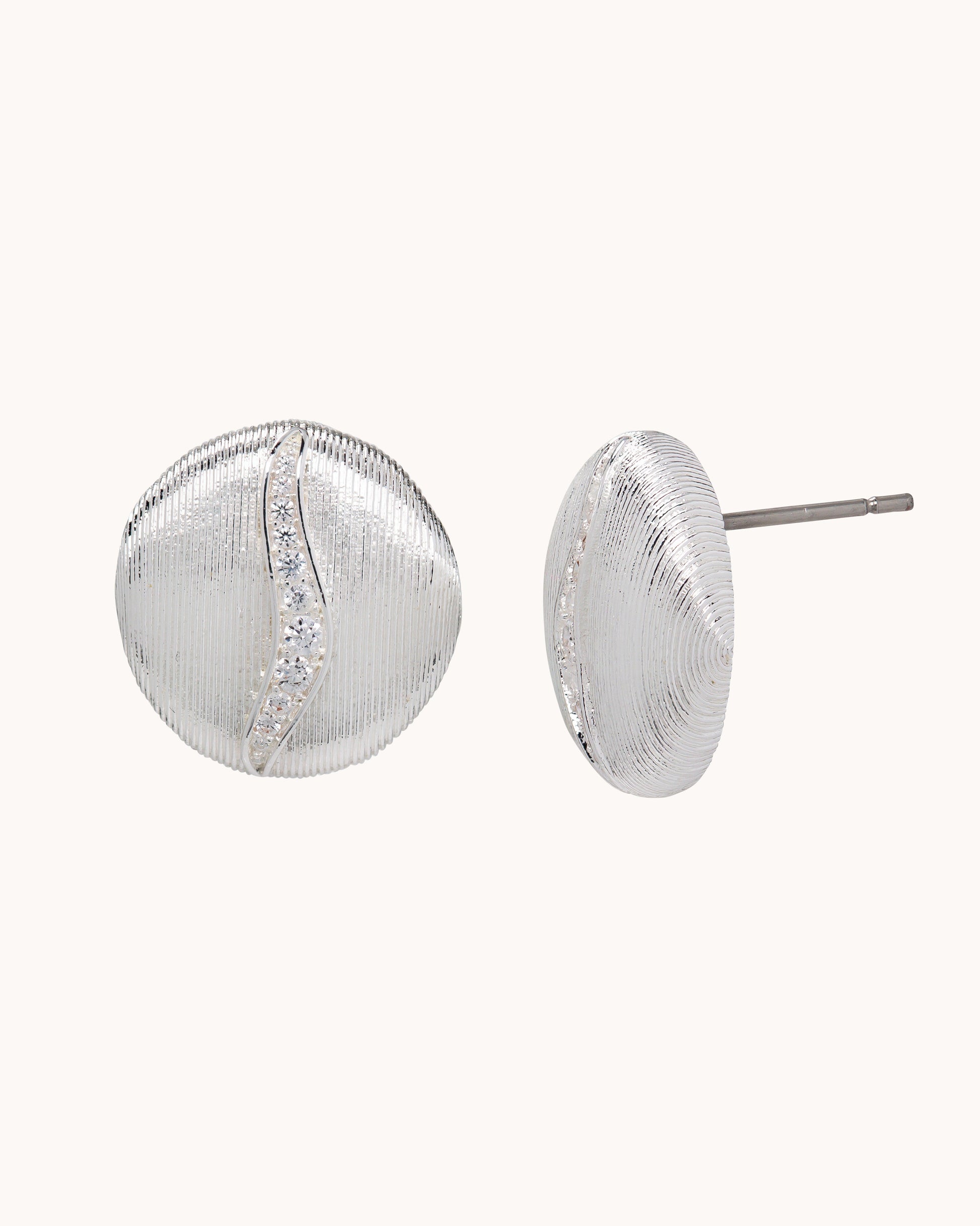 TRUE Solid or Plated Add a unique piece to your wardrobe with these Demi-Fine earrings. Made of 14K plated gold, the design features a Brushed Button Ear - Silver. 